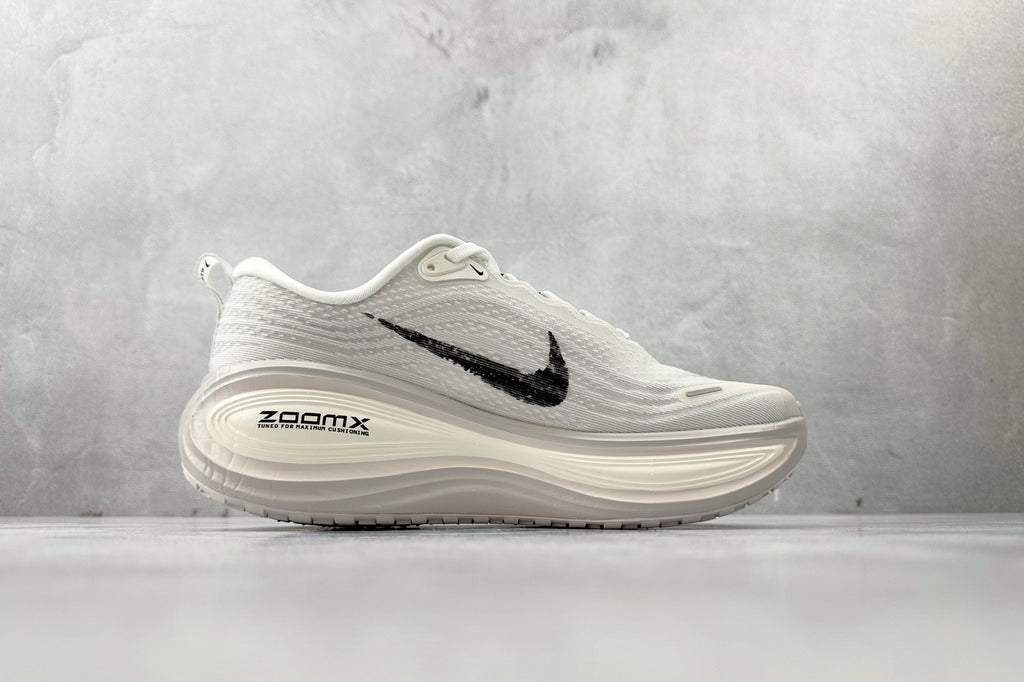 Nike Vomero Plus “Reverse Swoosh” Sneakers – White