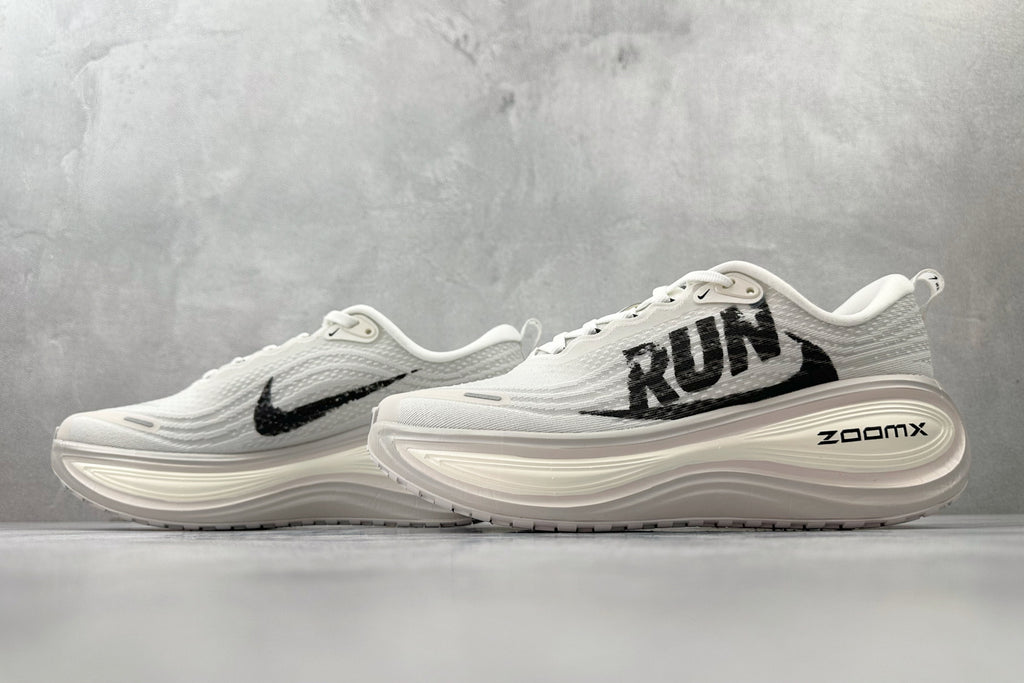 Nike Vomero Plus “Reverse Swoosh” Sneakers – White
