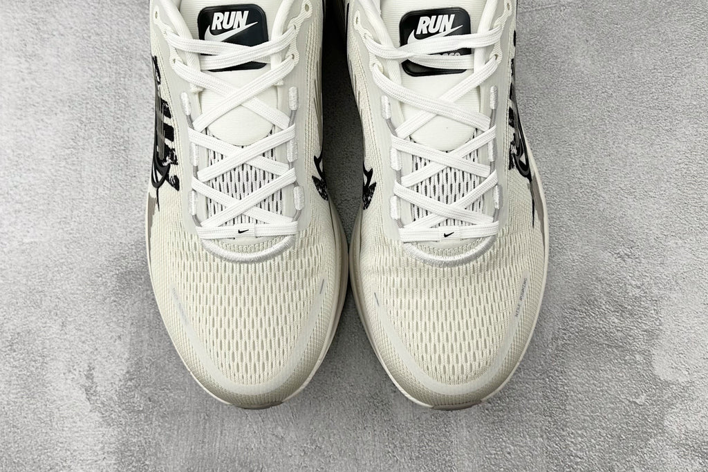 Nike Vomero 18 Sneakers – White with Black RUN Graphic