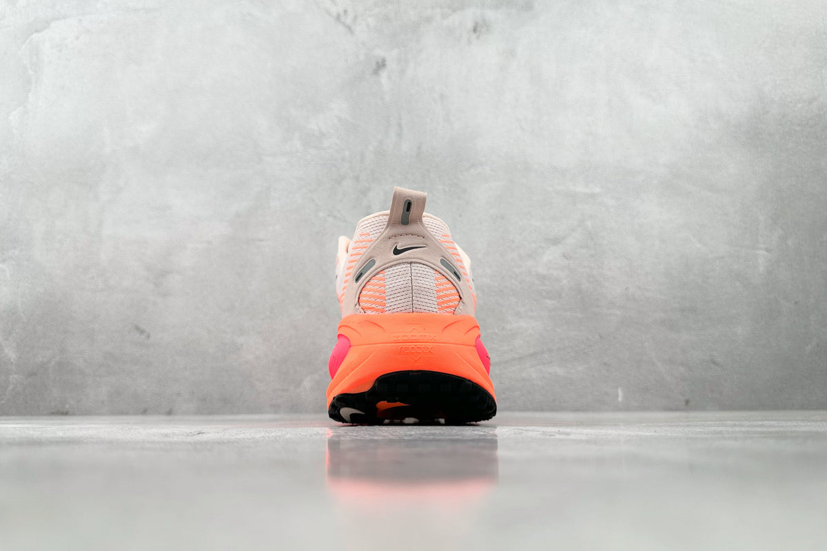 Nike Vomero 18 Sneakers – Orange and Pink Accents
