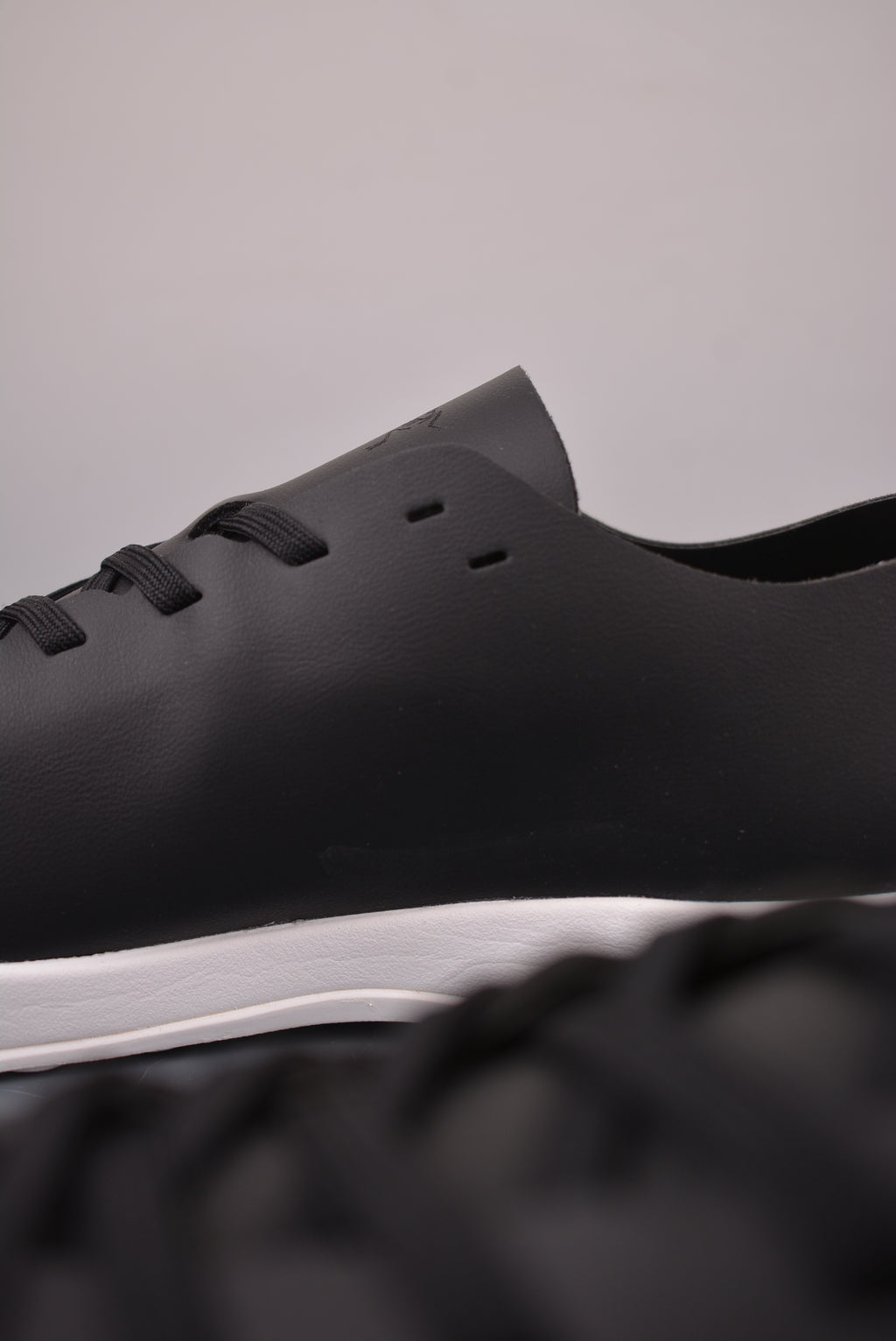 Arc’teryx Low-Top Lace-Up Shoes in Black and White