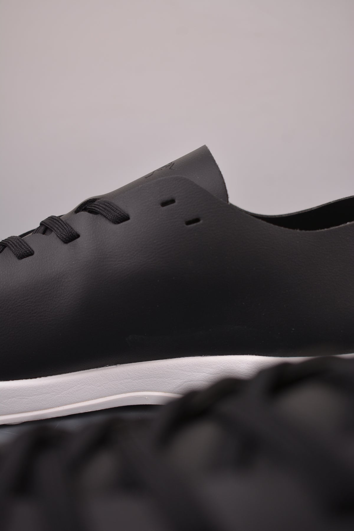 Arc’teryx Low-Top Lace-Up Shoes in Black and White