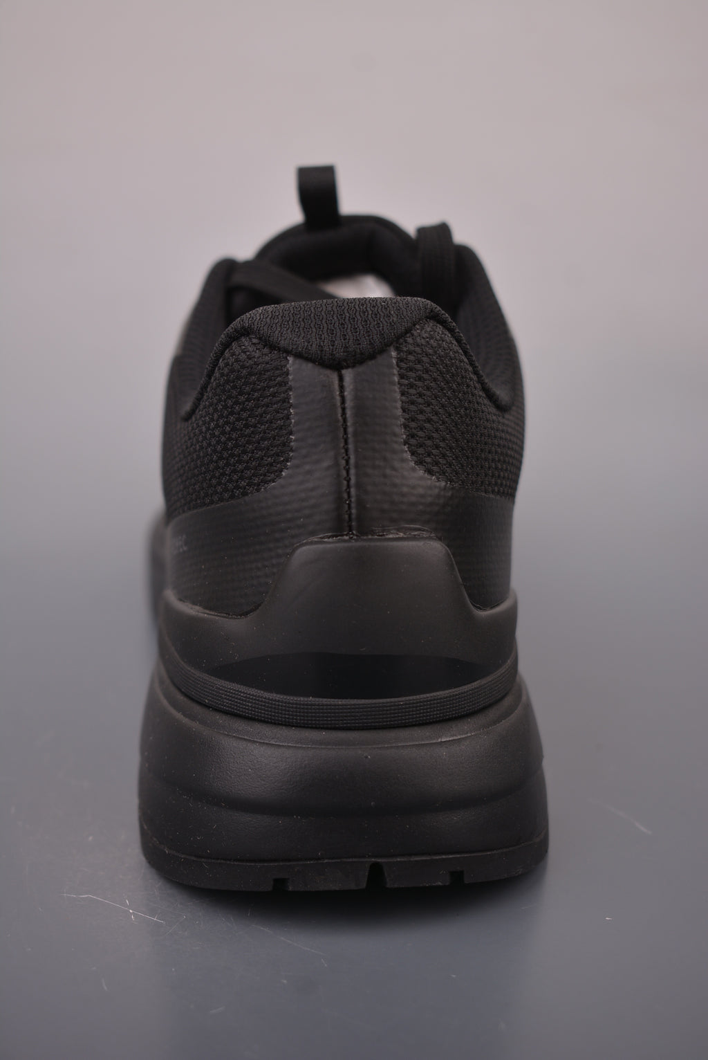 Arc’teryx Low-Top Lace-Up Shoes in Black with Gold Logo