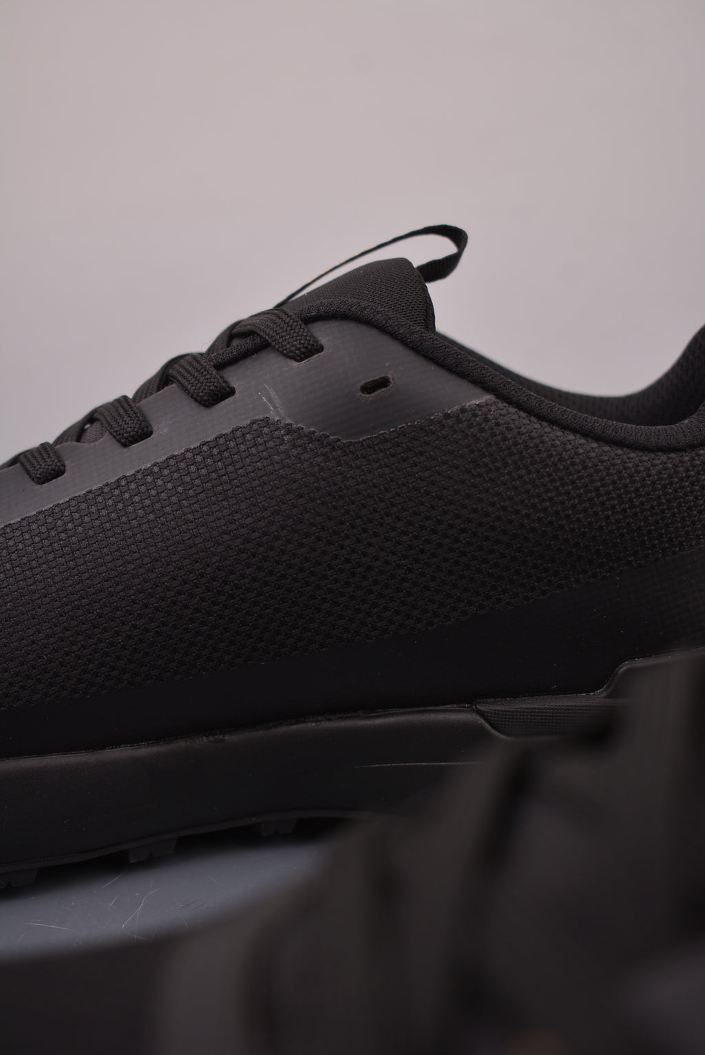 Arc’teryx Low-Top Lace-Up Shoes in Black with Gold Logo